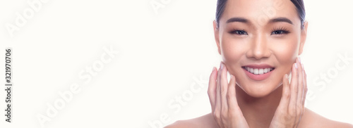 Beautiful Young Asian Woman with Clean Fresh Skin isolate on white background. Spa, Face care, Facial treatment, Beauty and Cosmetics concept. Washing face, big smile. Banner frame.