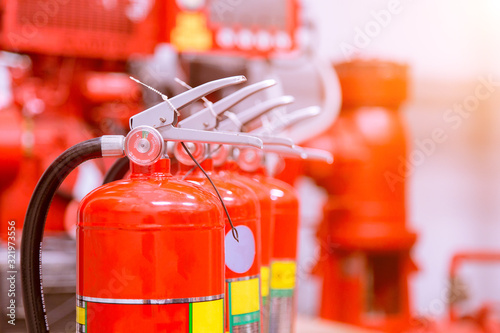 Red tank of fire extinguisher Overview of a powerful industrial fire extinguishing system.