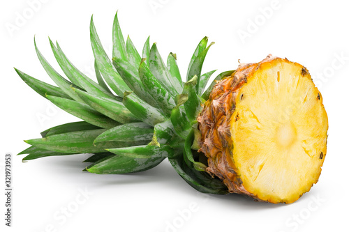 Ripe pineapple cut in half isolated on white with clipping path.