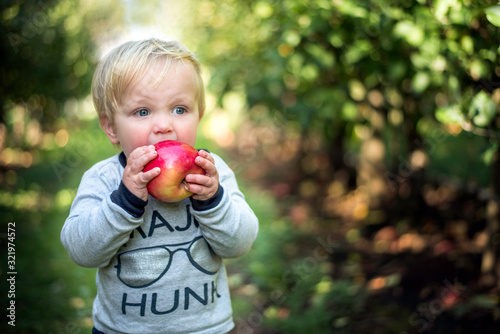 little kid with an apple