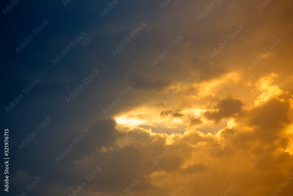 Sunlight shine out from colorful clouds background, Bahrain.