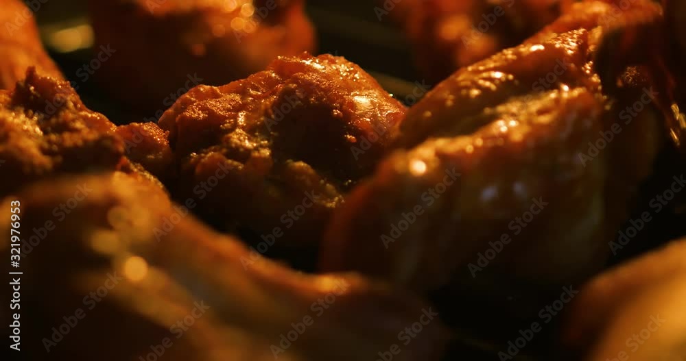 Close-up shot Grilling bbq barbecue chicken in the hot oven 