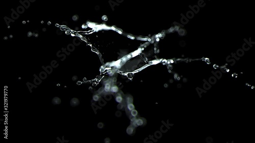 Incredibly beautiful splash of water in slow motion. The force of surface tension breaks the surface of the water   for small drops and tendrils. Fully CG with alpha channel ready for compositing.