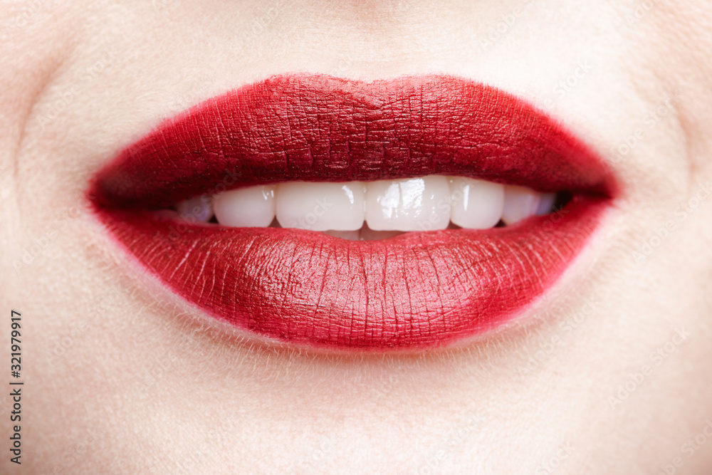 Closeup macro portrait of female red smiling lips with day beauty makeup. Closeup macro portrait of female red smiling lips with day beauty makeup.