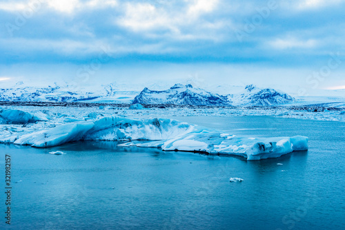 Blue Icebergs floating in beautiful Jokulsarlon lagoon Iceland