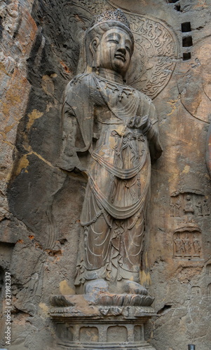 Big statue made in limestone of bodhisattvas. The main cave  Fengxiangsi Cave  of Longmen Grottoes in Luoyang . A world heritage Site in Henan province  China. 