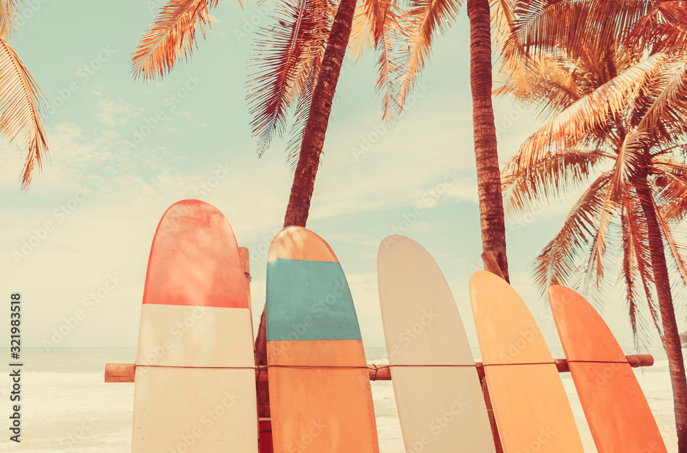 Surfboard and palm tree on beach background. Stock Photo | Adobe Stock