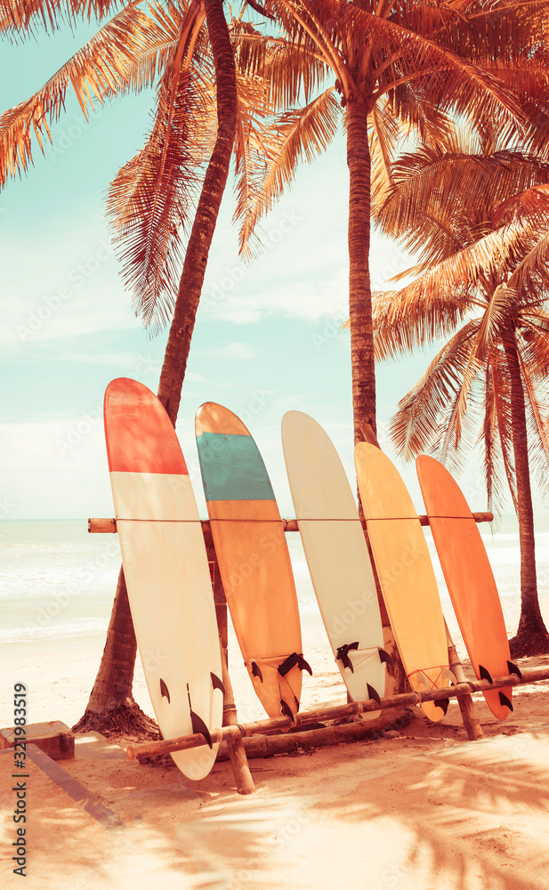 Surfboard and palm tree on beach background. Stock Photo | Adobe Stock