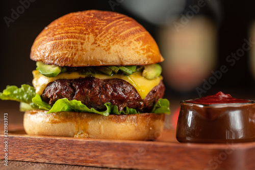 Fresh home-made hamburger served on wood