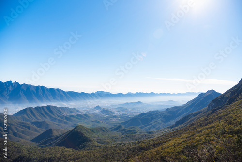 Monterrey Nuevo León México Aerial view of Chipinque Mountain range against cloudy sky.  photo