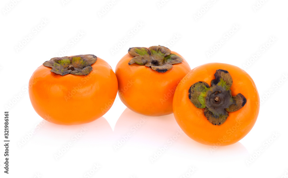 ripe persimmons isolated on white background ripe persimmons isolated on white background