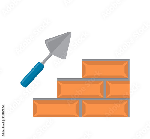 tools for building bricks and metal trowel on a white background