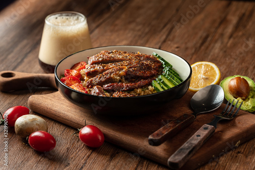 plum bbq sauce pork chop with broccoli and steamed brown rice