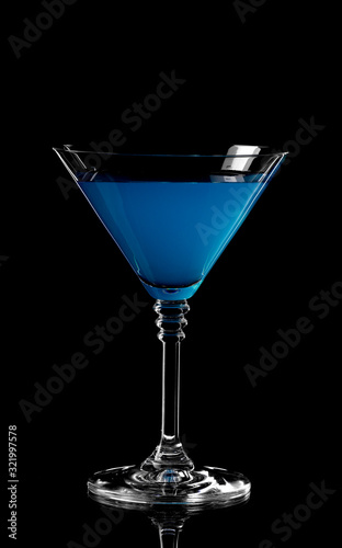 Close up of blue curacao drink. Blue lagoon cocktail in glass