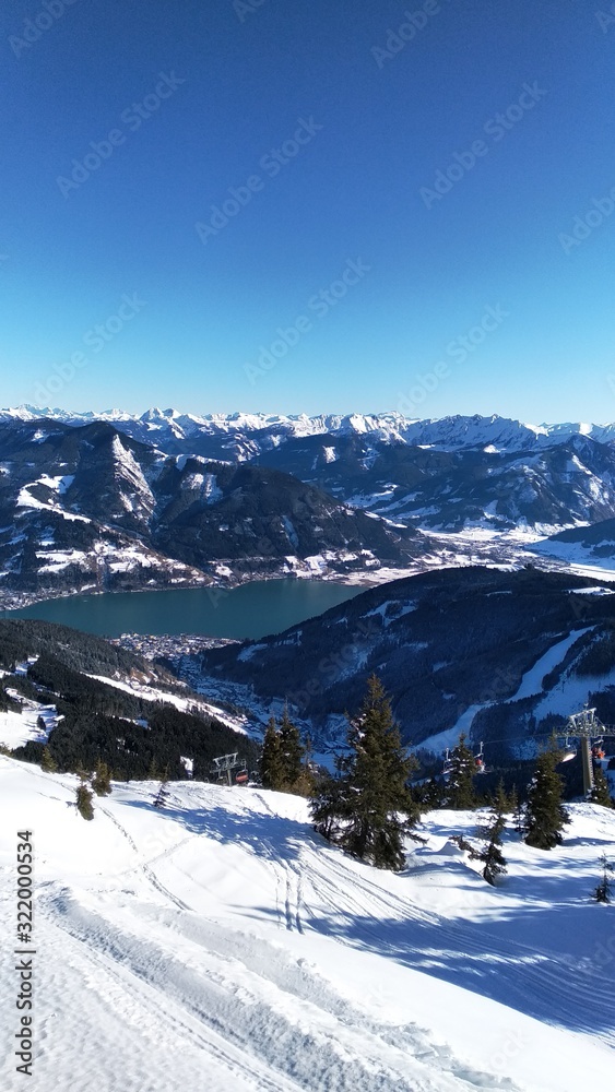 Austria - Zell Am See. View from the top of the mountain. on lake. Blue cloudless sky