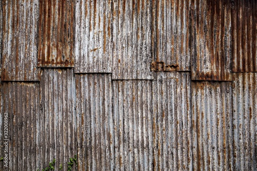 Принти на полотні Closeup shot of a rusty corrugated iron on the surface