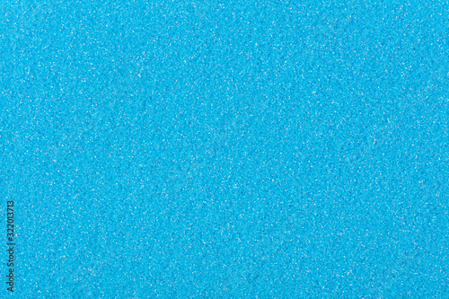 New holiday glitter texture, background in light blue tone. High quality texture.