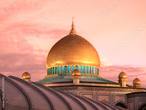 Jame' Asr Hassanil Bolkiah Mosque at sunset in Bandar Seri Begawan, Brunei photo