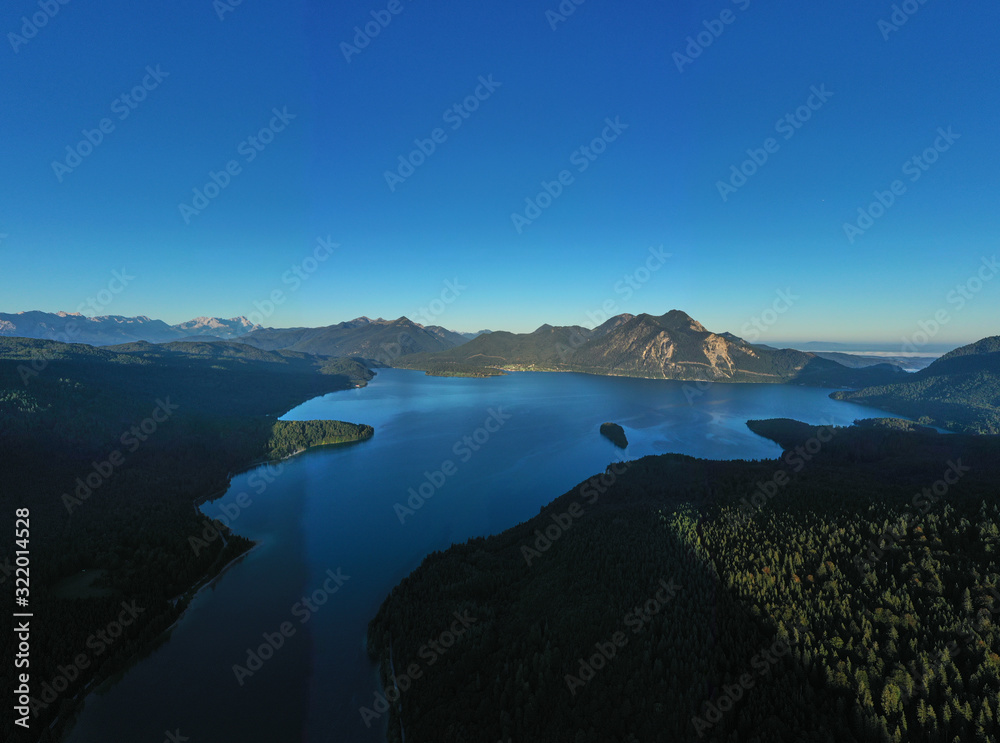 Beautiful panorama of lake Walchensee, Bavaria Germany. Flying on drone. Island of Sassau