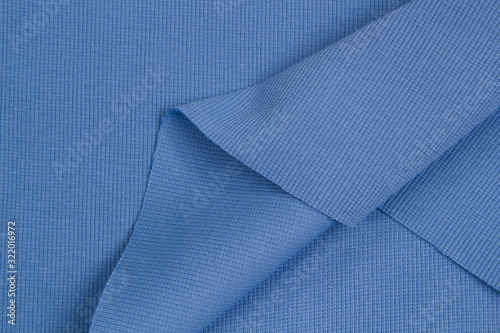 Fabric cotton fold, top view. Blue textile