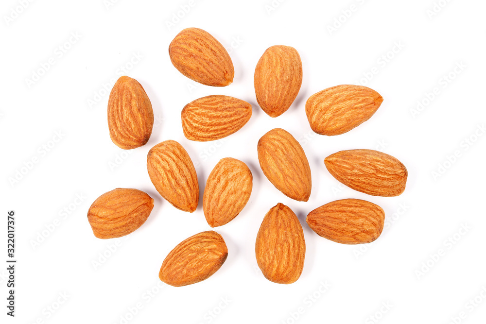 Organic almond seed on white background. nature food Organic almond seed on white background. nature food