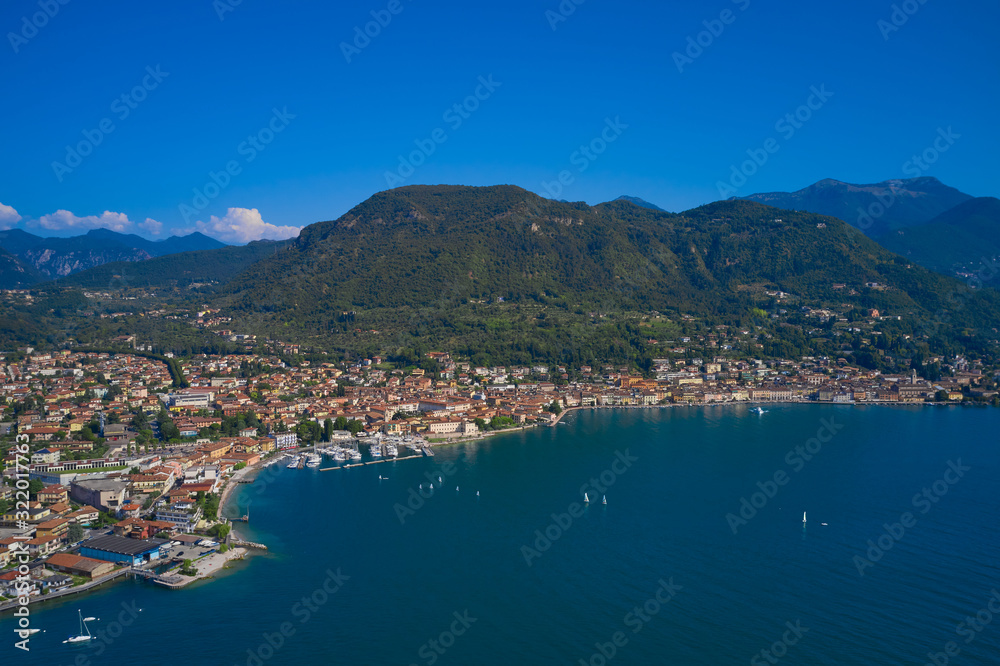 Panoramic view of the center of Salo, Italy. Lake Garda, blue sky, mountains