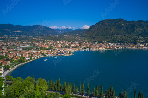 Panoramic view of the center of Salo, Italy. Lake Garda, blue sky, mountains