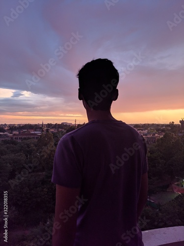 silhouette of man in sunset