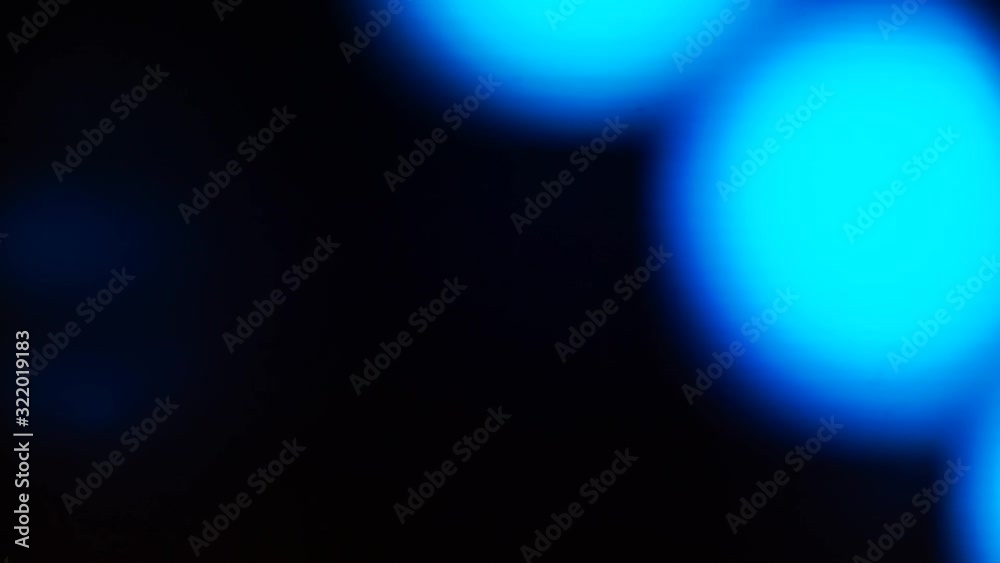 Background made from the movement of blue spots of light. Background made from the movement of blue spots of light.