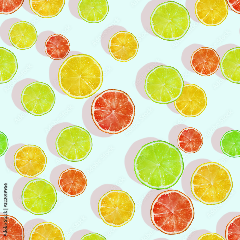 Seamless pattern with lemon, lime and grapefruit slices. Fruit background. Creative design for wrapping paper, printing on fabrics, clothing, products.