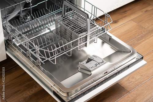 Dishwasher integrated in a modern kitchen photo