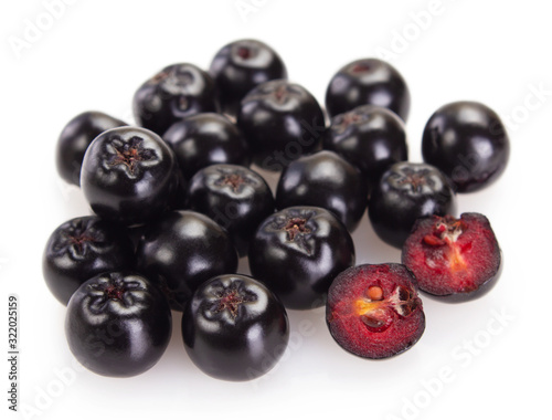 Fresh chokeberry on white background