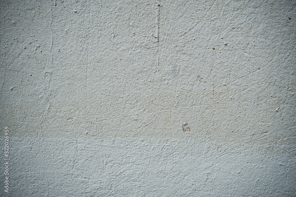 Texture of an old wall covered with paint. Background image of a worn paint coated surface Texture of an old wall covered with paint. Background image of a worn paint coated surface