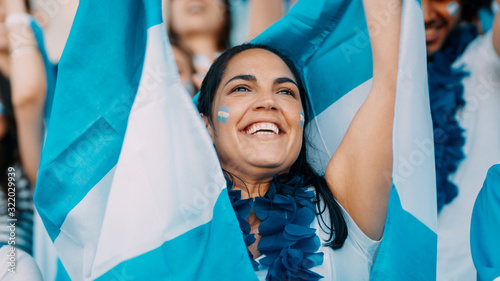 Argentinian football supporters cheering from stadium photo