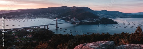 Panorama view of Rande bridge over estuary of Vigo at sunset, Galicia