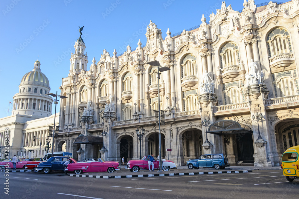 Great theatre of Havana with parked retro cars in Havana, Cuba