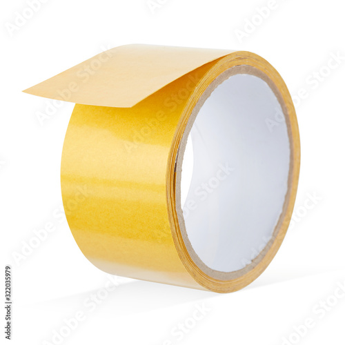 Reel of double-sided tape in a vertical position with the end of the tape detached, isolated on a white background.