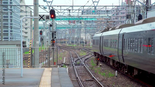 come in to a station in Fukuoka, Japan