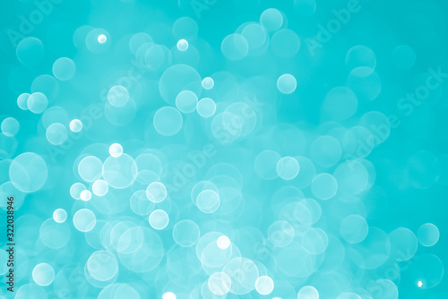 abstract aqua blue background with soft blur bokeh light effect