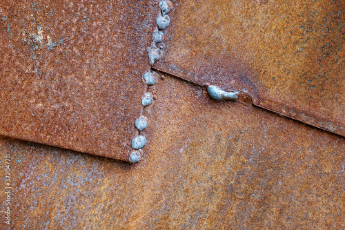 rusty iron sheet texture of surfaces welded together