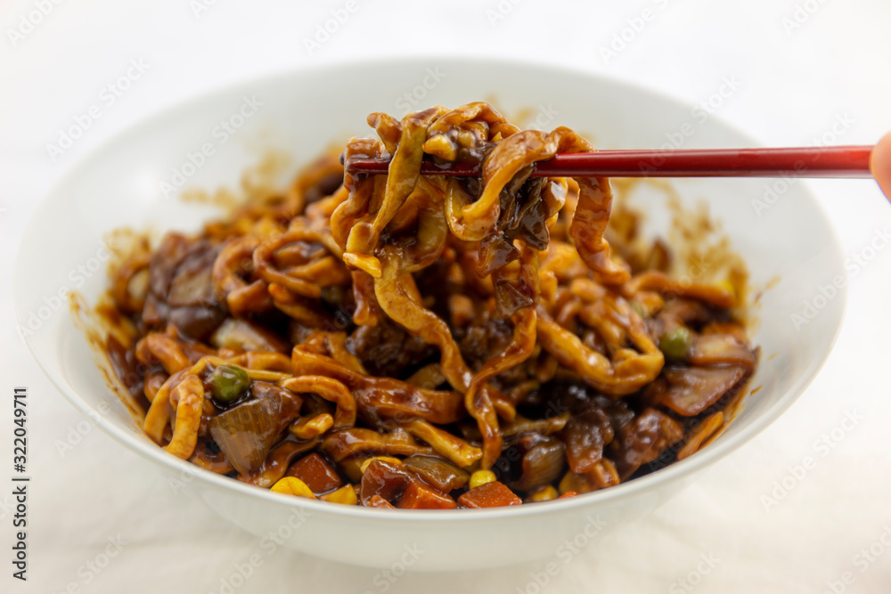 Jajangmyeon, noodle dish topped with black sauce Jajangmyeon, noodle dish topped with black sauce