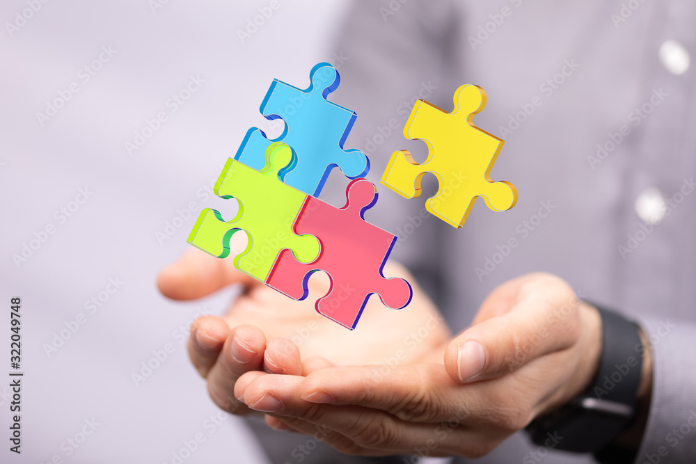 puzzle hand solution concept business. puzzle hand solution concept business.