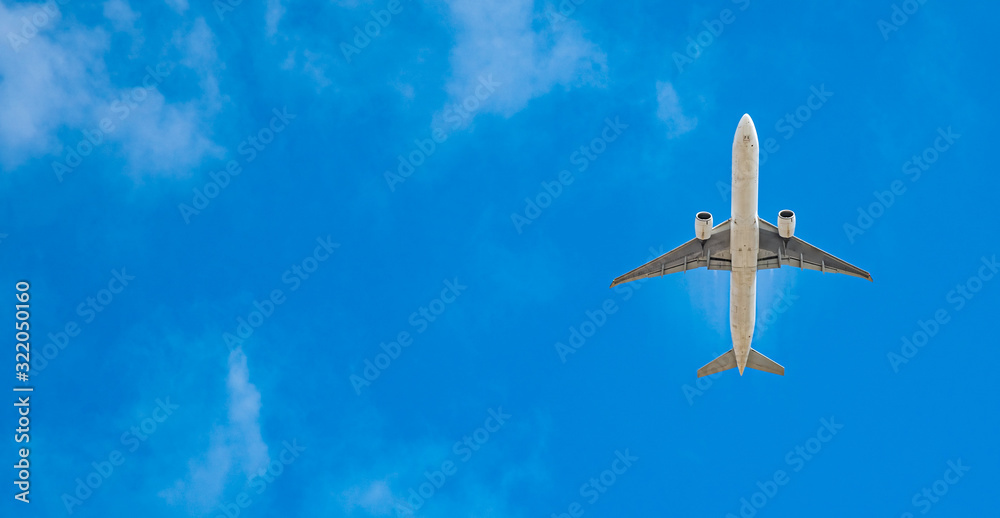 modern passenger plane on blue sky, copy space modern passenger plane on blue sky, copy space