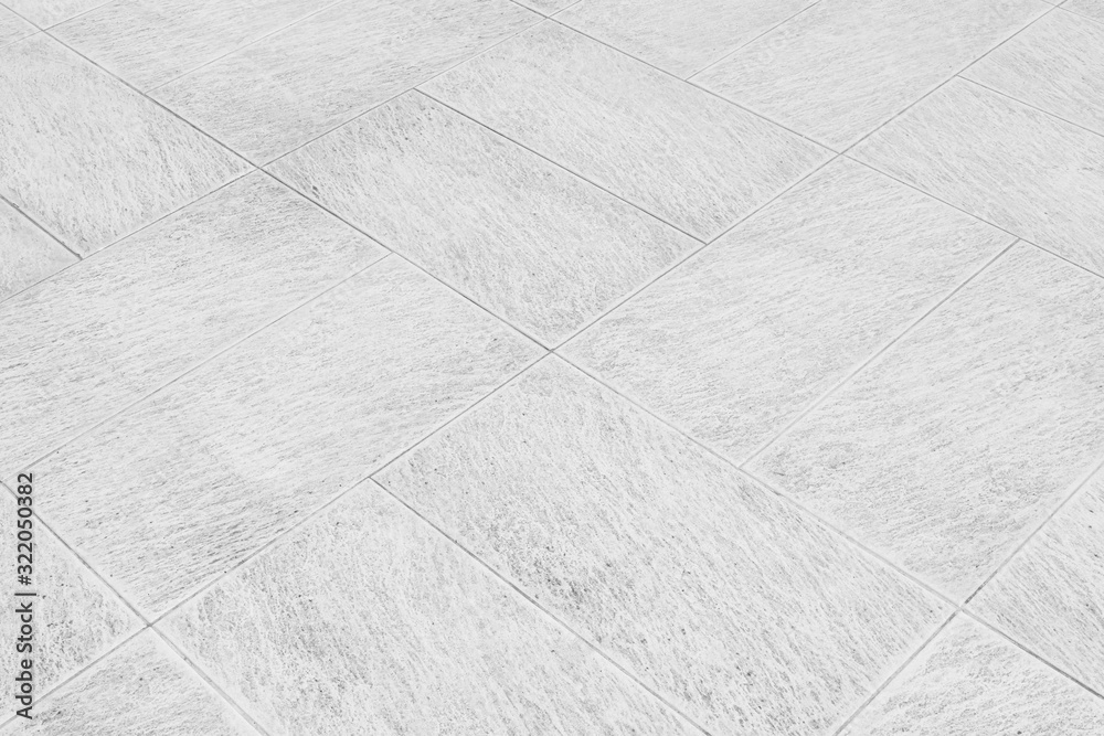 Stone floor tile in perspective view with gray abstract texture, square seamless pattern of nature material i.e. stone, rock. Rough surface for decorative wall, floor of interior exterior building. Stone floor tile in perspective view with gray abstract texture, square seamless pattern of nature material i.e. stone, rock. Rough surface for decorative wall, floor of interior exterior building.