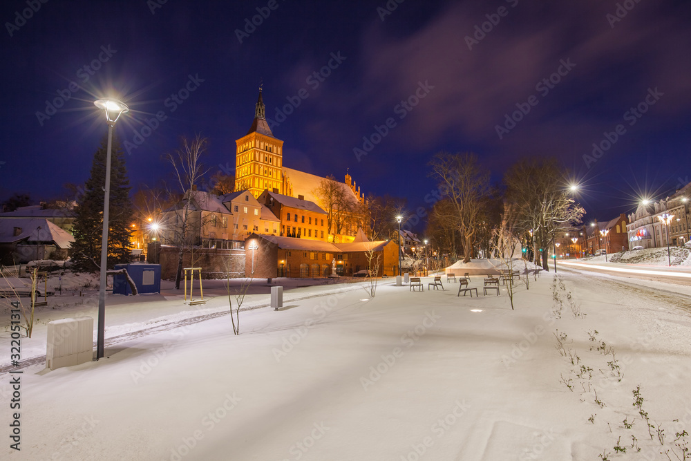 Obraz premium Urban lighting of the squares and the historic cathedral in the city of Olsztyn - Poland