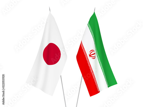 National fabric flags of Japan and Iran isolated on white background. 3d rendering illustration.