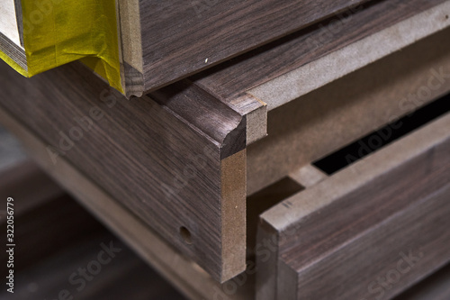 Dresser elements in a workshop. Solid wood chest of drawers. Furniture manufacture