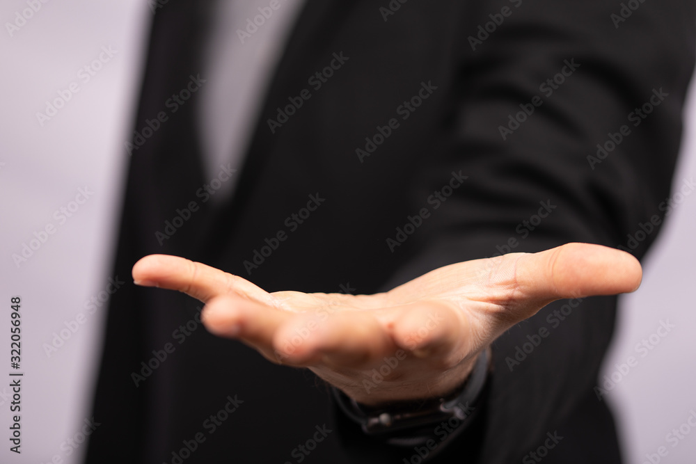Businessman without head holding something without theme