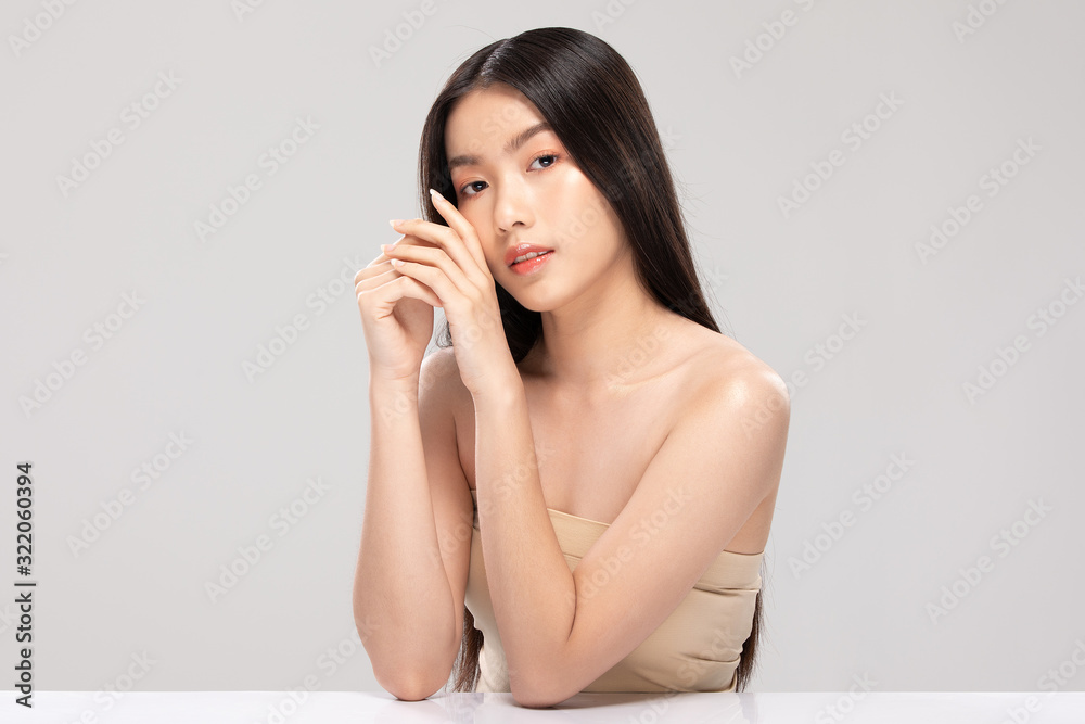 Beautiful Asian young woman touching soft cheek smile with clean and fresh skin Happiness and cheerful with positive emotional,isolated on white background,Beauty and Cosmetics Concept Beautiful Asian young woman touching soft cheek smile with clean and fresh skin Happiness and cheerful with positive emotional,isolated on white background,Beauty and Cosmetics Concept