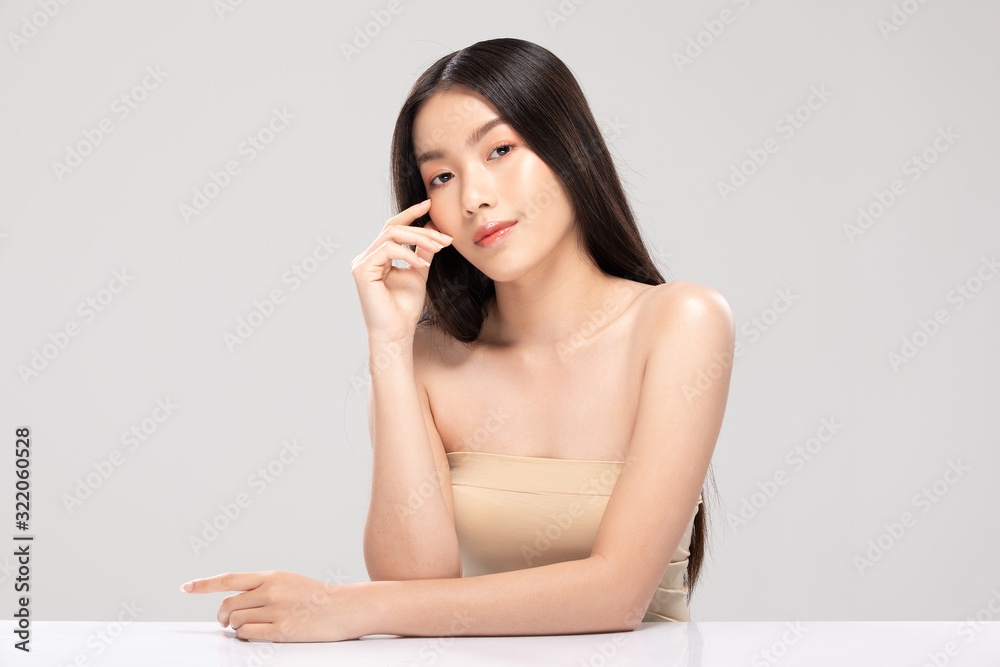 Beautiful Asian young woman touching soft cheek smile with clean and fresh skin Happiness and cheerful with positive emotional,isolated on white background,Beauty and Cosmetics Concept Beautiful Asian young woman touching soft cheek smile with clean and fresh skin Happiness and cheerful with positive emotional,isolated on white background,Beauty and Cosmetics Concept